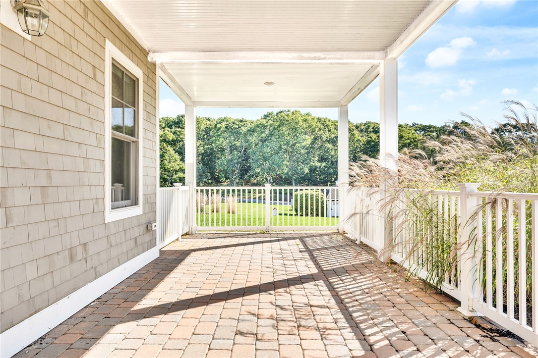1 Compass Way, Unit 101 Westerly, RI 02891 - Photo 20 of 27 The 34' by 11' outdoor covered terrace adds outdoor living space
