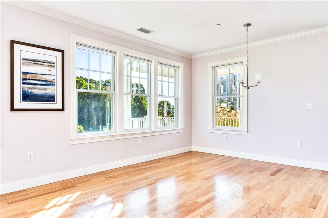 1 Compass Way, Unit 101 Westerly, RI 02891 - Photo 9 of 27 A large dining area seats 8 people easily