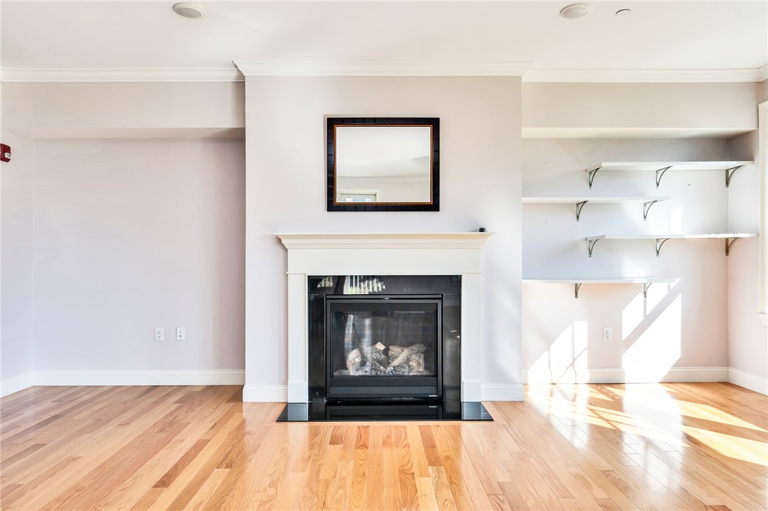 1 Compass Way, Unit 101 Westerly, RI 02891 - Photo 10 of 27 A gas fireplace for those chilly evenings!