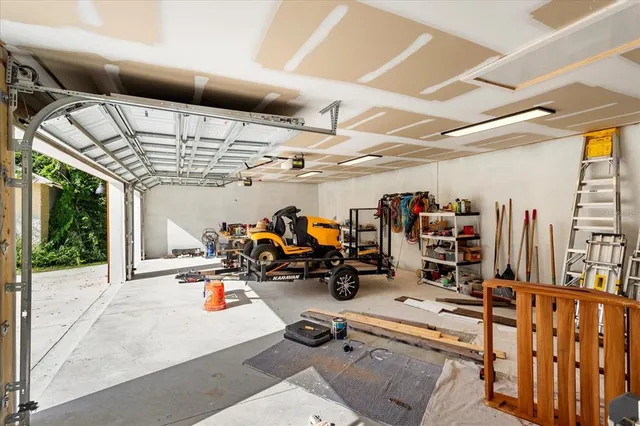 a view of a garden with a building in the background