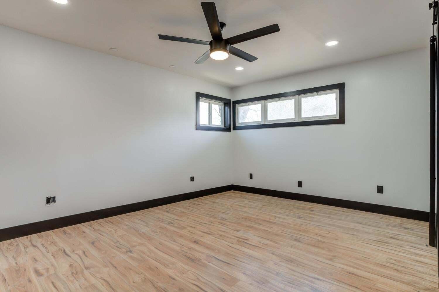 3410 40th Street Lubbock, TX 79413 - Photo 25 of 29 a view of an empty room with a window