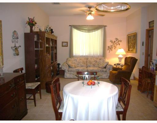 5000 Southwest 198th Terrace Southwest Ranches, FL 33332 - Photo 12 of 16 a dining room with furniture and window