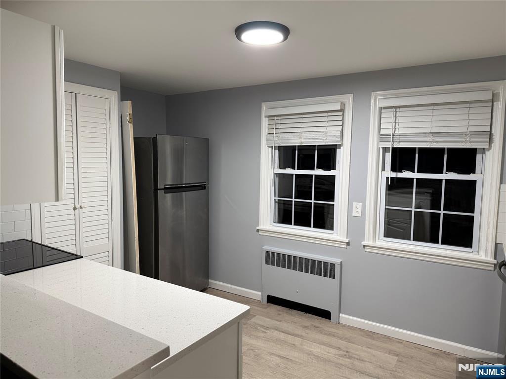 9 B Cottage Lane, Unit B Upper Saddle River, NJ 07458 - Photo 3 of 13 a bedroom with a bed and a window