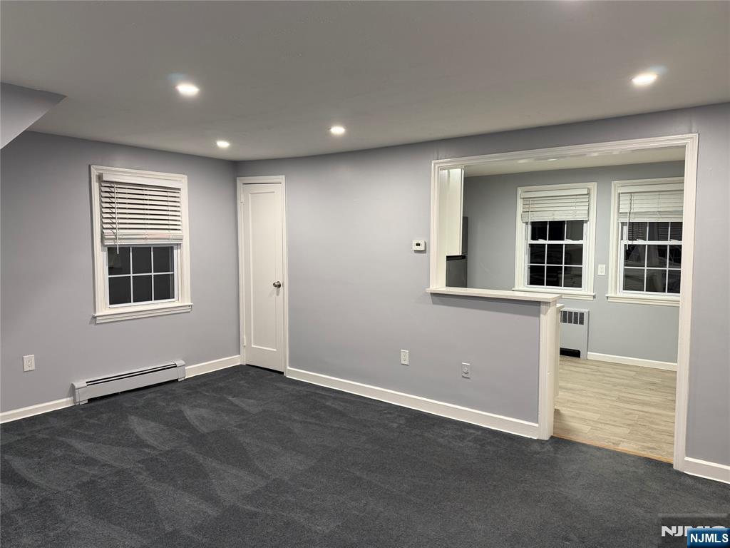 9 B Cottage Lane, Unit B Upper Saddle River, NJ 07458 - Photo 7 of 13 an empty room with windows