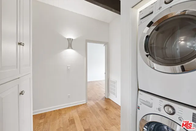 a bathroom with a shower toilet and sink