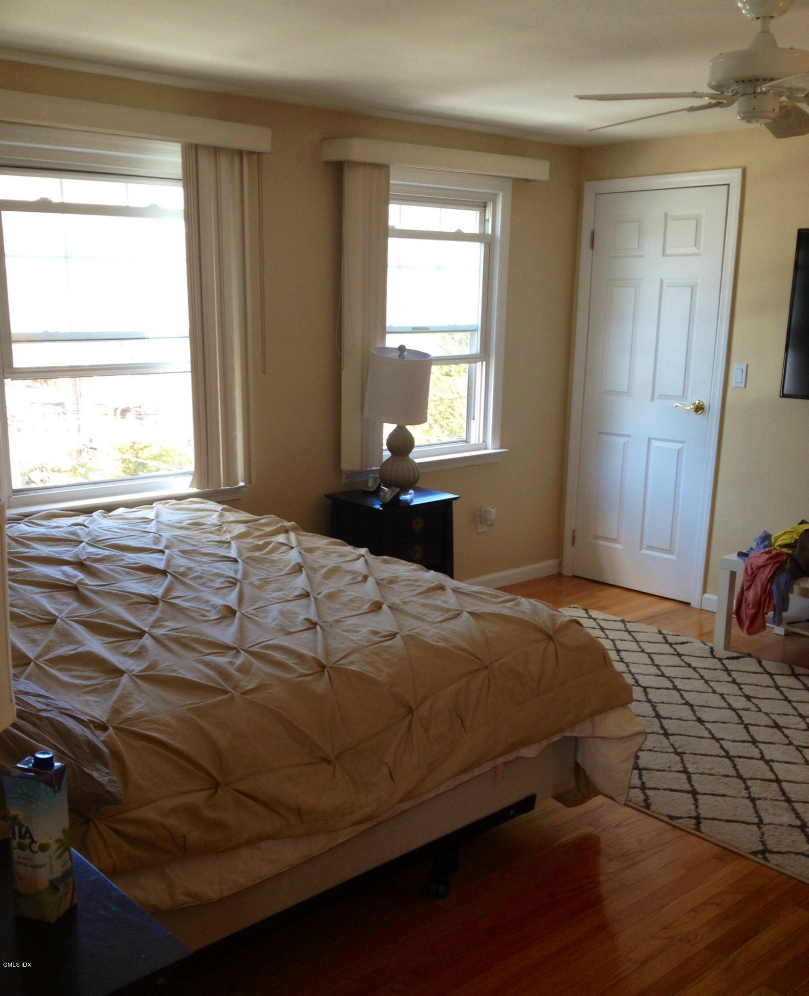 19 Wescott Street Riverside, CT 06878 - Photo 6 of 13 a bedroom with a bed and a window