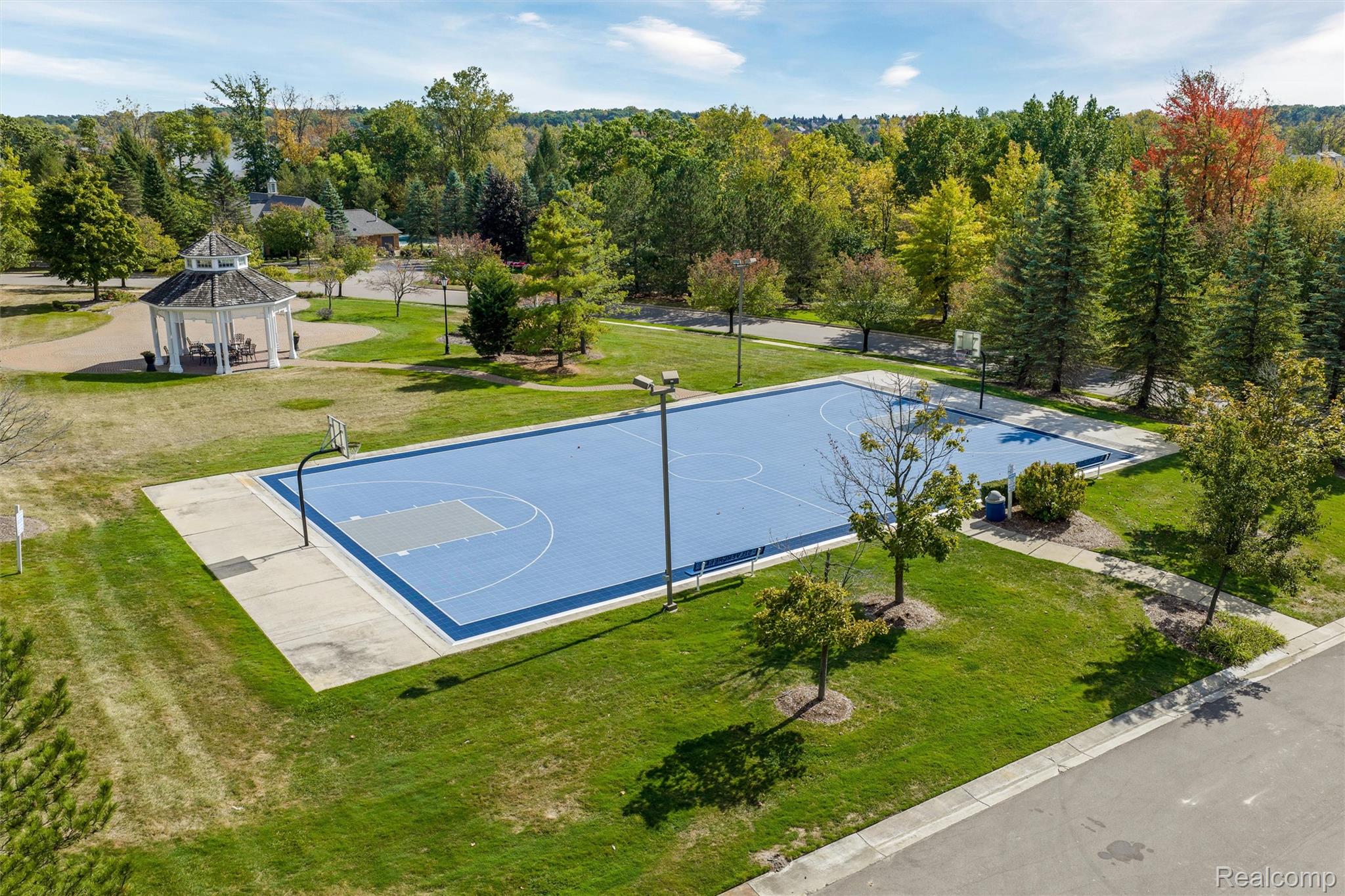 3582 Tremonte Circle Rochester, MI 48306 - Photo 19 of 23 View of basketball court with community basketball court, a lawn, and a gazebo