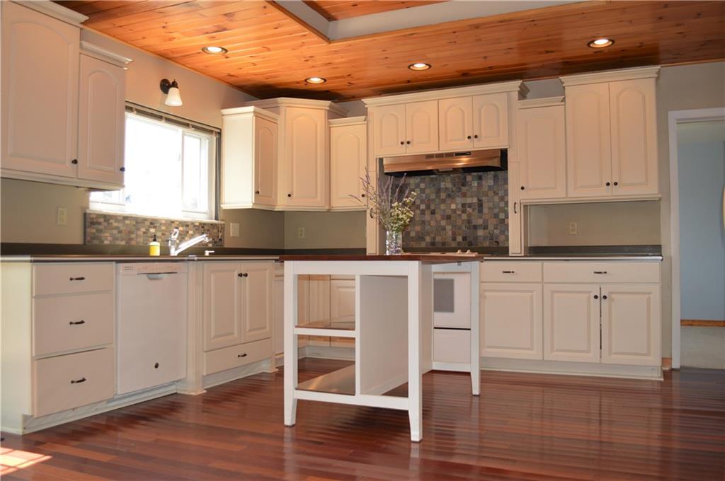 804 Hickory Grade Road Bridgeville, PA 15017 - Photo 4 of 25 Gorgeous updated kitchen with hardwood floors and plank ceiling.