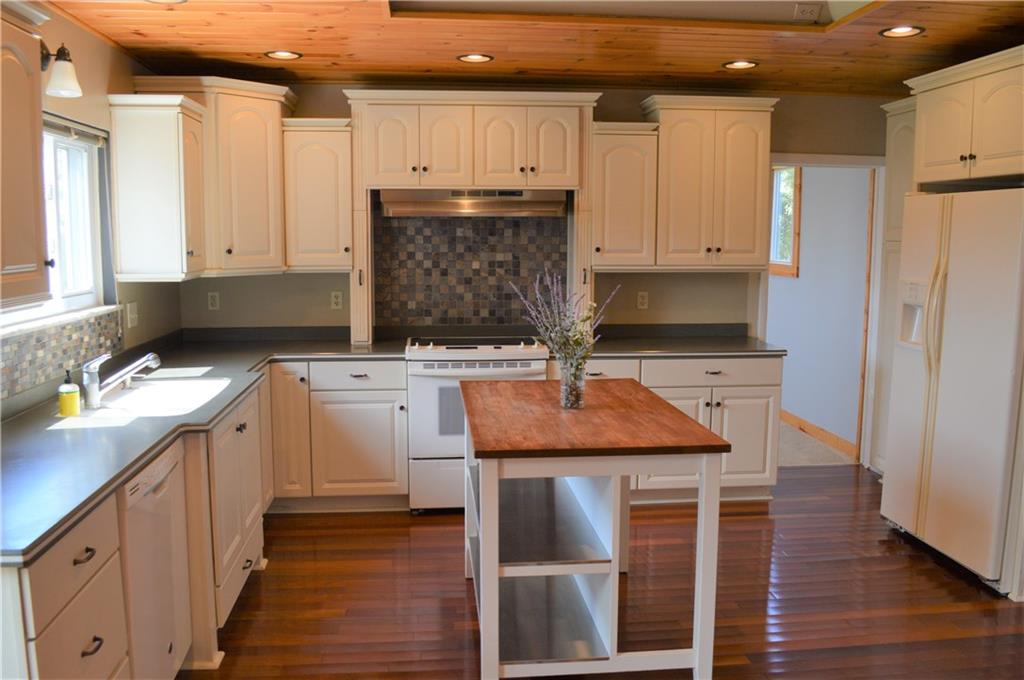 804 Hickory Grade Road Bridgeville, PA 15017 - Photo 5 of 25 Kitchen Island with stainless shelves.