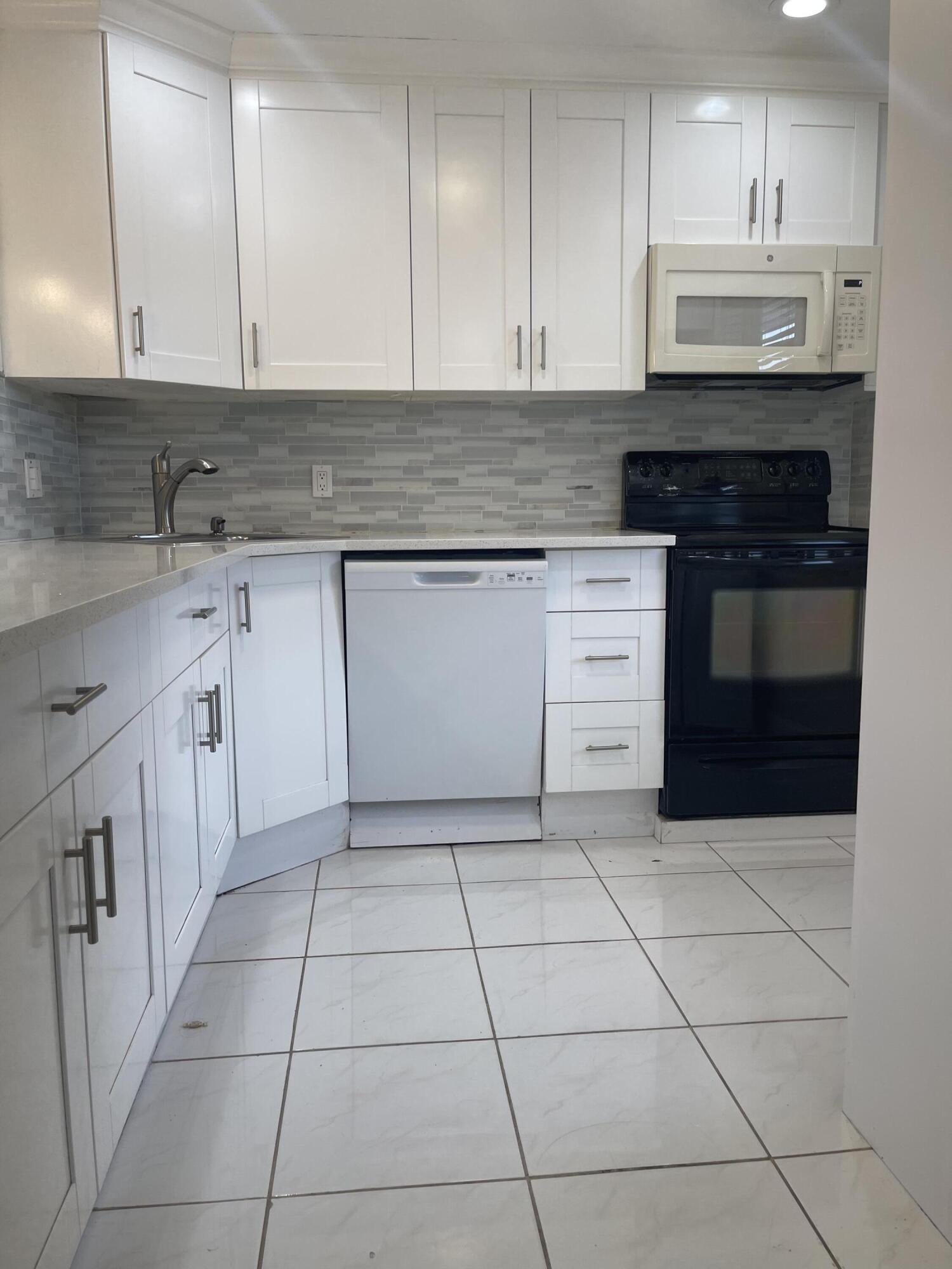 9210 Southwest 3rd Street, Unit 216 Boca Raton, FL 33428 - Photo 1 of 14 3FE84764-8E57-4EC8-9AC8-D6A6FA2A85D6