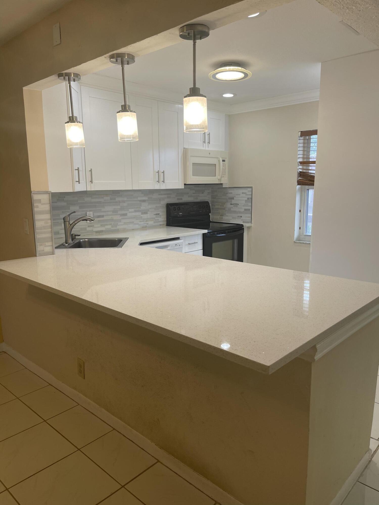 9210 Southwest 3rd Street, Unit 216 Boca Raton, FL 33428 - Photo 11 of 14 9822D15C-D317-45EA-99D0-9CD8A31ADF5C