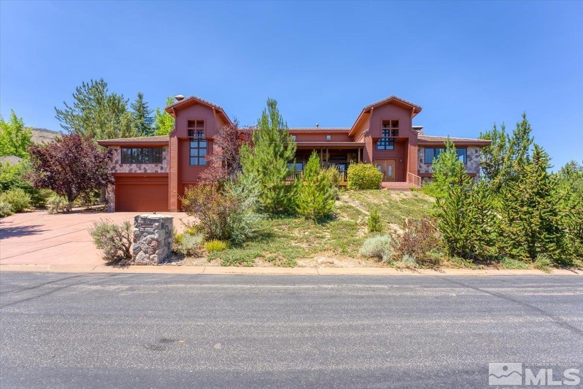 4285 Bitteroot Road Reno, NV 89519 - Photo 2 of 40 front view of a house with a yard