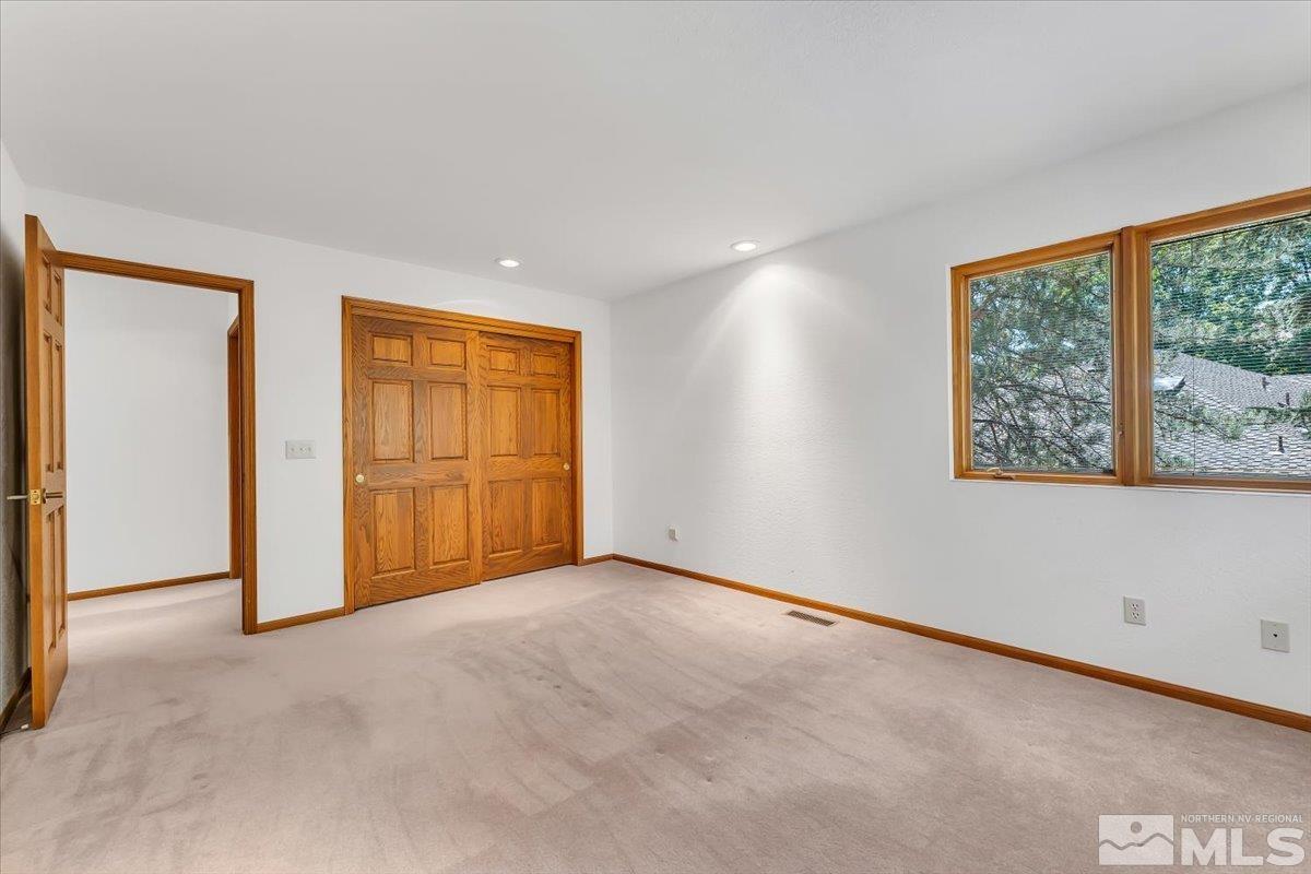 4285 Bitteroot Road Reno, NV 89519 - Photo 22 of 40 a view of an empty room with a window