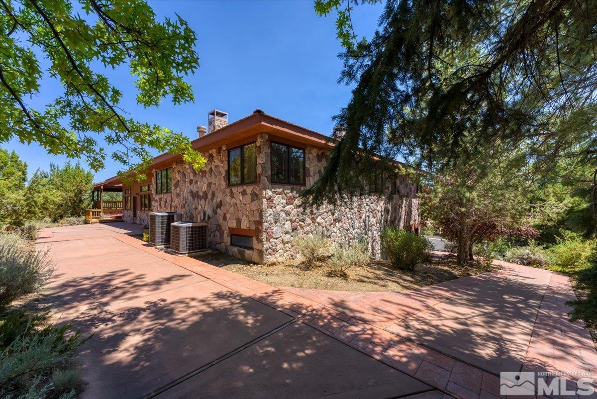 4285 Bitteroot Road Reno, NV 89519 - Photo 30 of 40 a front view of a house with a yard