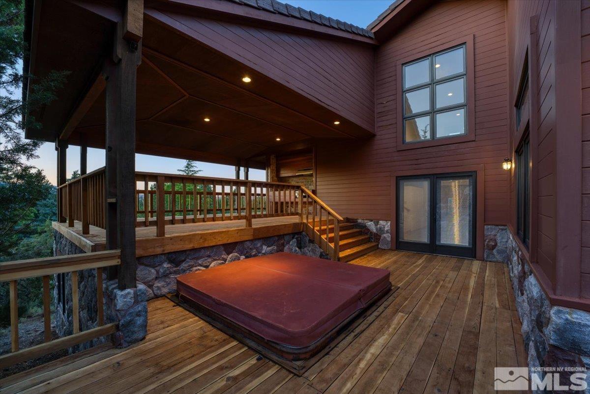4285 Bitteroot Road Reno, NV 89519 - Photo 34 of 40 a balcony with chairs and wooden floor