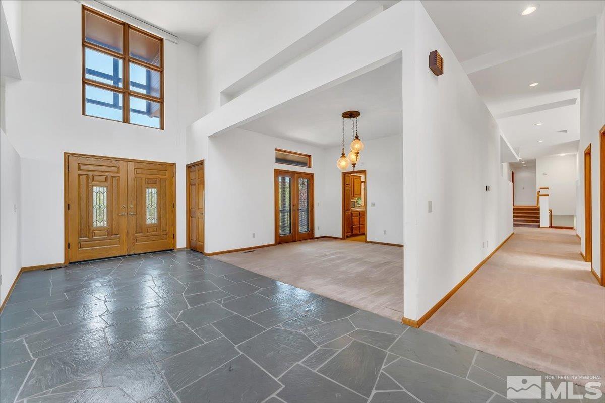 4285 Bitteroot Road Reno, NV 89519 - Photo 4 of 40 a view of livingroom and hallway with wooden floor