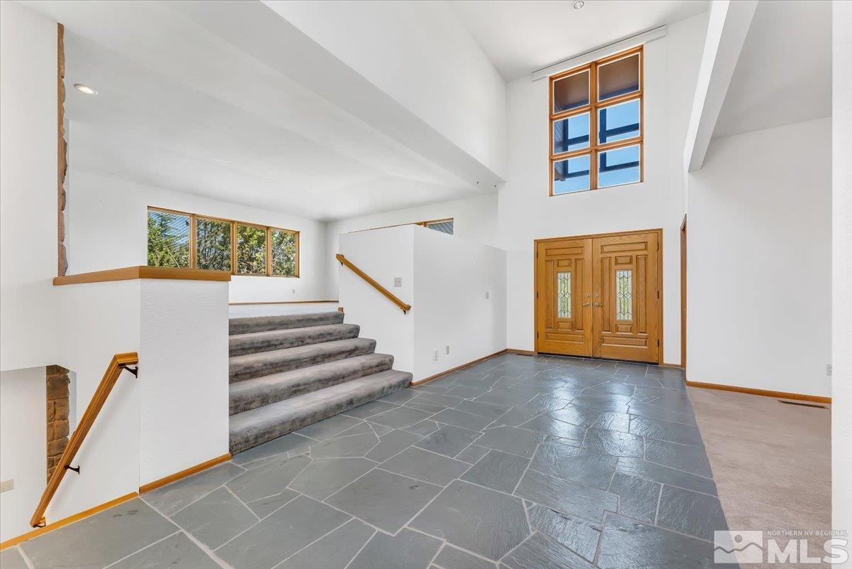 4285 Bitteroot Road Reno, NV 89519 - Photo 5 of 40 a view of an entryway with wooden floor