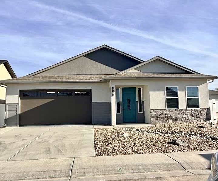 2452 Hamilton Road, Unit B Grand Junction, CO 81505 - Photo 1 of 1 a front view of a house