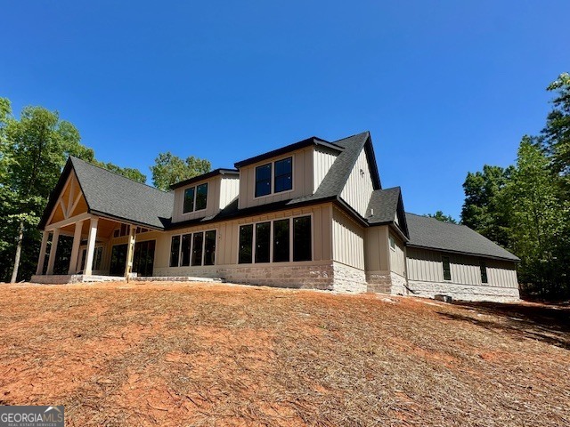 106 Equestrian Drive Forsyth, GA 31029 - Photo 12 of 52 a front view of a house with a yard