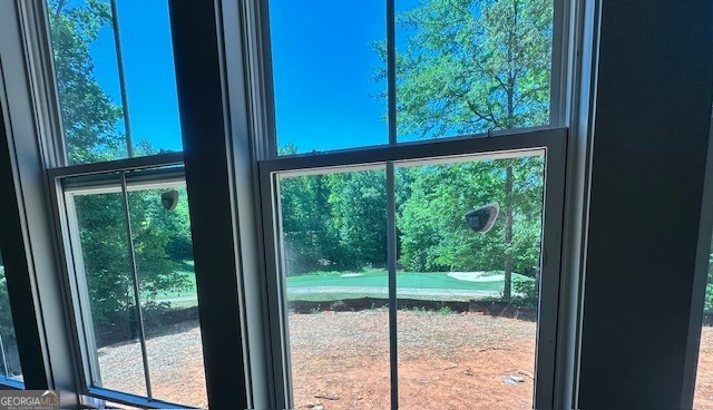 106 Equestrian Drive Forsyth, GA 31029 - Photo 16 of 52 a view of a yard from a window