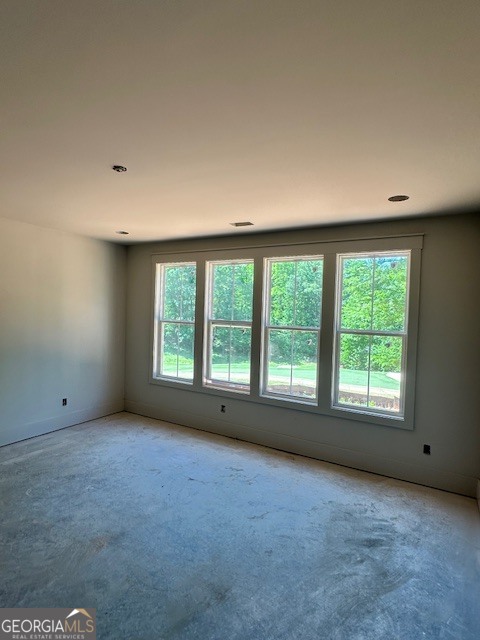 106 Equestrian Drive Forsyth, GA 31029 - Photo 18 of 52 a view of an empty room with a window