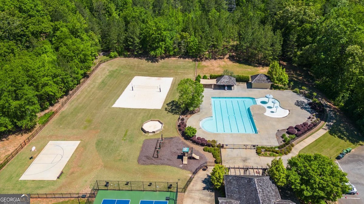 106 Equestrian Drive Forsyth, GA 31029 - Photo 26 of 52 an aerial view of a house with a swimming pool