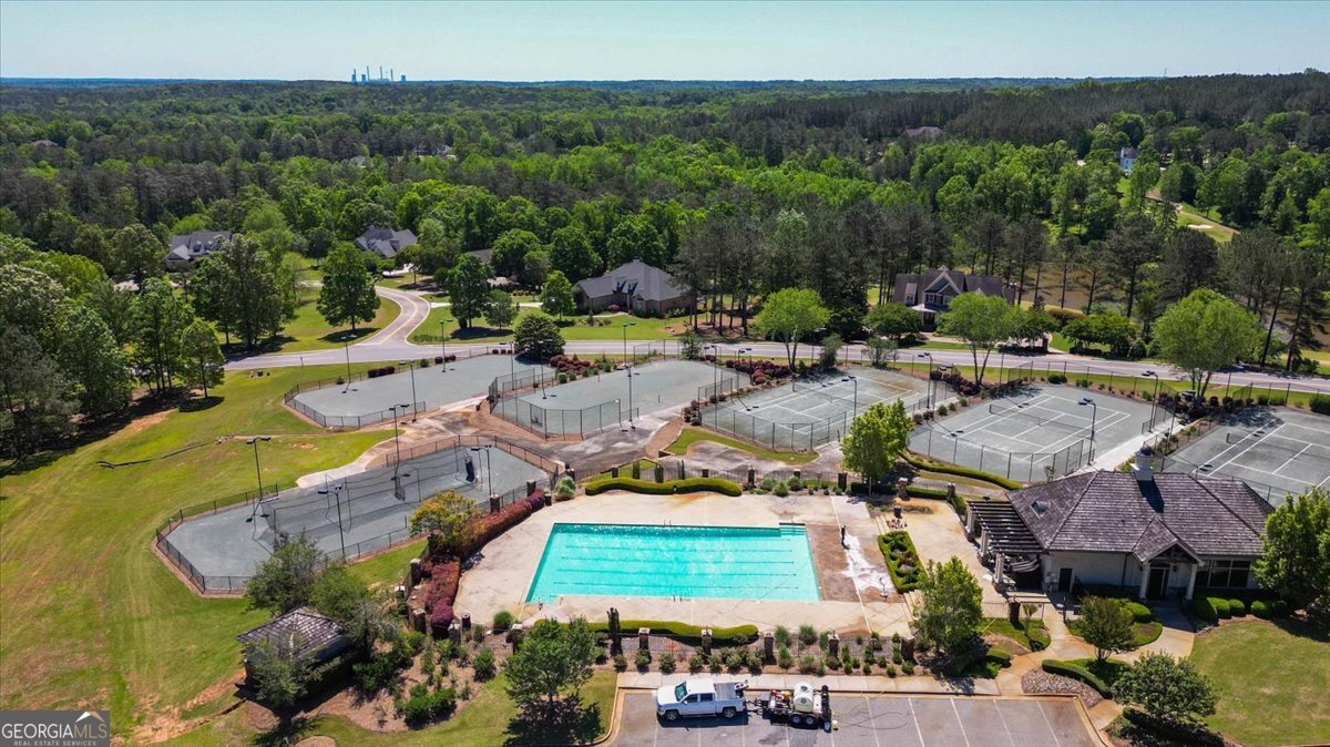 106 Equestrian Drive Forsyth, GA 31029 - Photo 27 of 52 an aerial view of residential houses with outdoor space