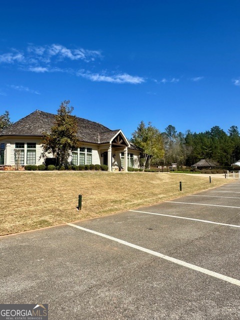 106 Equestrian Drive Forsyth, GA 31029 - Photo 33 of 52 a view of swimming pool with an outdoor space and seating area