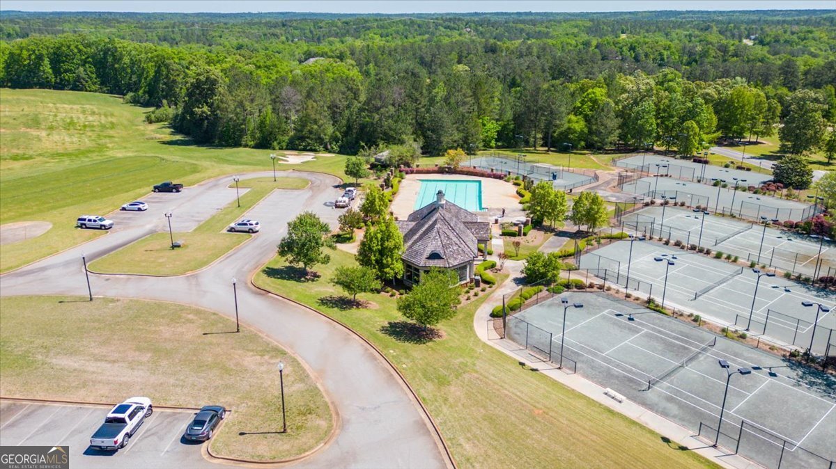 106 Equestrian Drive Forsyth, GA 31029 - Photo 49 of 52 an aerial view of a house with a swimming pool