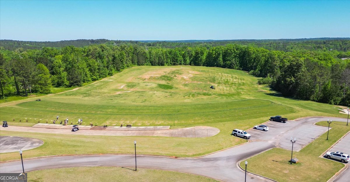 106 Equestrian Drive Forsyth, GA 31029 - Photo 50 of 52 a view of an outdoor space and a yard