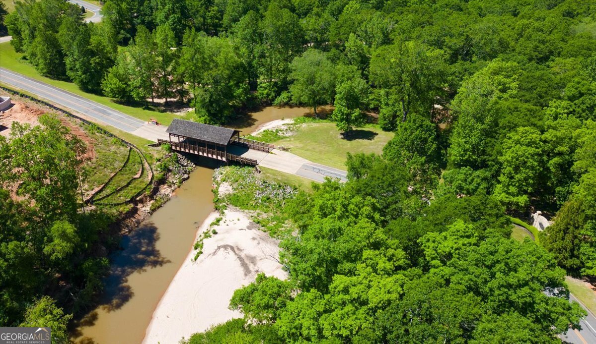 106 Equestrian Drive Forsyth, GA 31029 - Photo 51 of 52 an aerial view of residential house with outdoor space and trees all around