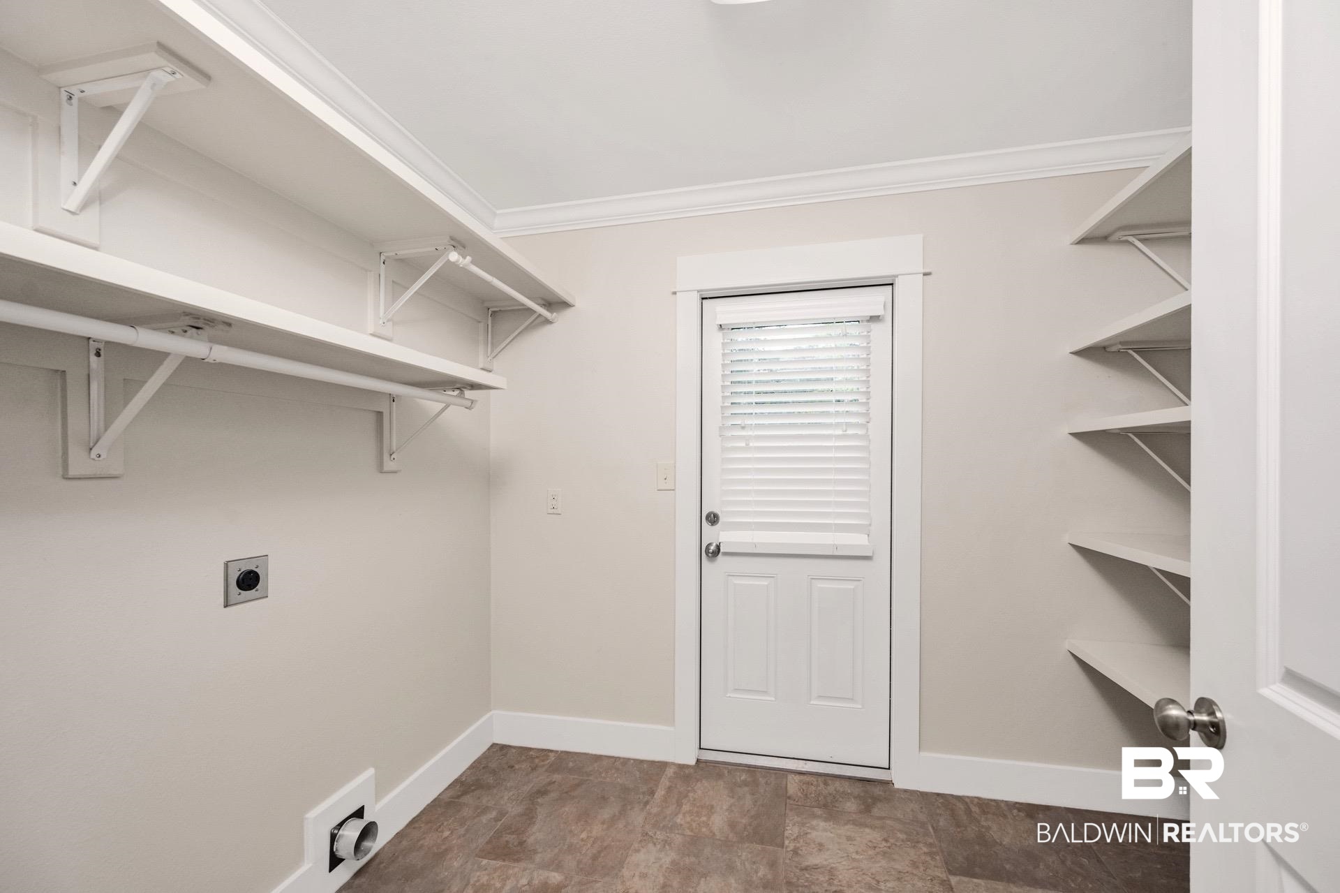 409 Rosa Avenue Fairhope, AL 36532 - Photo 11 of 31 pantry / Laundry room
