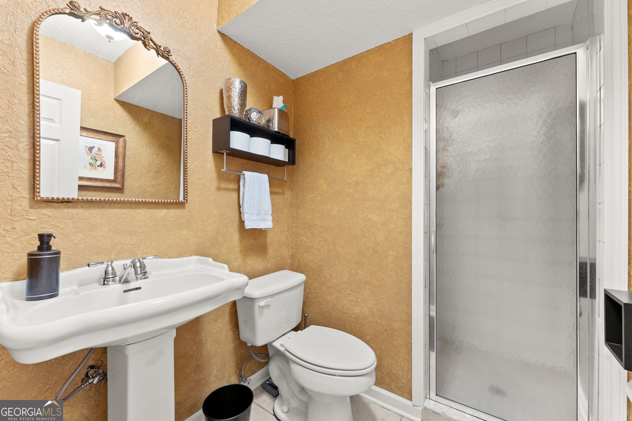 323 St Marys River Bluff Road St. George, GA 31562 - Photo 25 of 43 a bathroom with a sink and a toilet