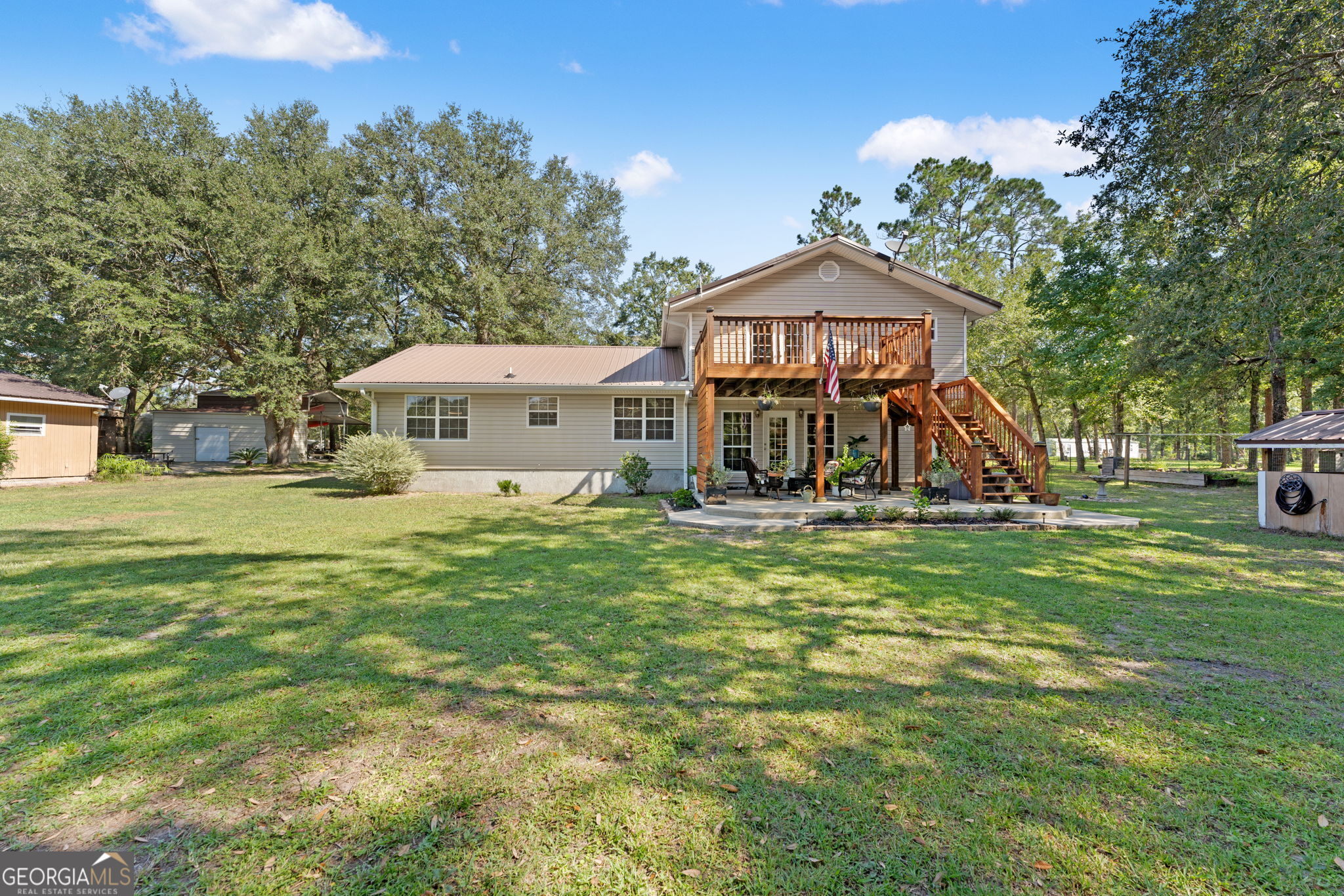 323 St Marys River Bluff Road St. George, GA 31562 - Photo 36 of 43 a view of a house with a yard