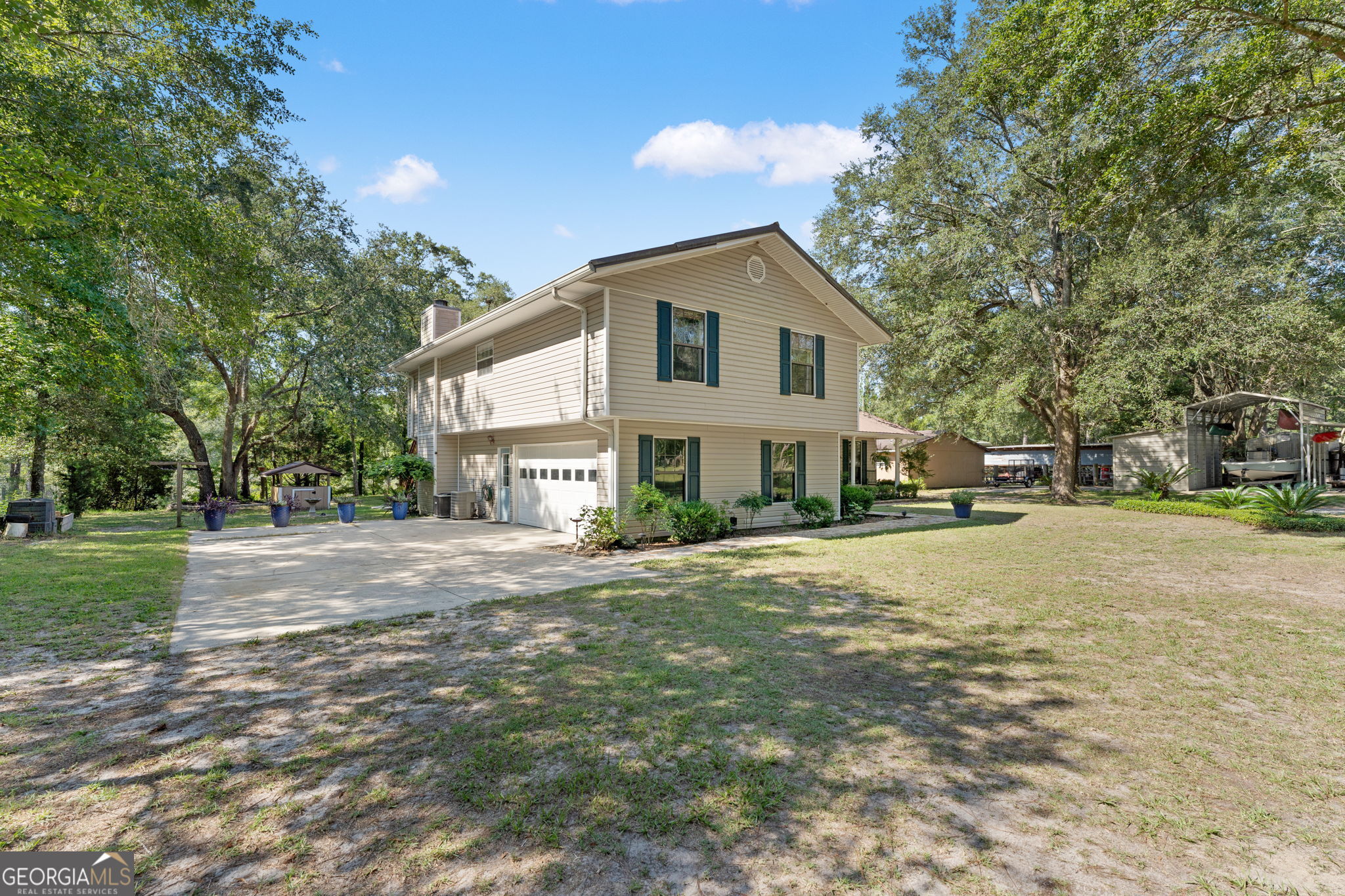 323 St Marys River Bluff Road St. George, GA 31562 - Photo 5 of 43 a view of a house with a yard