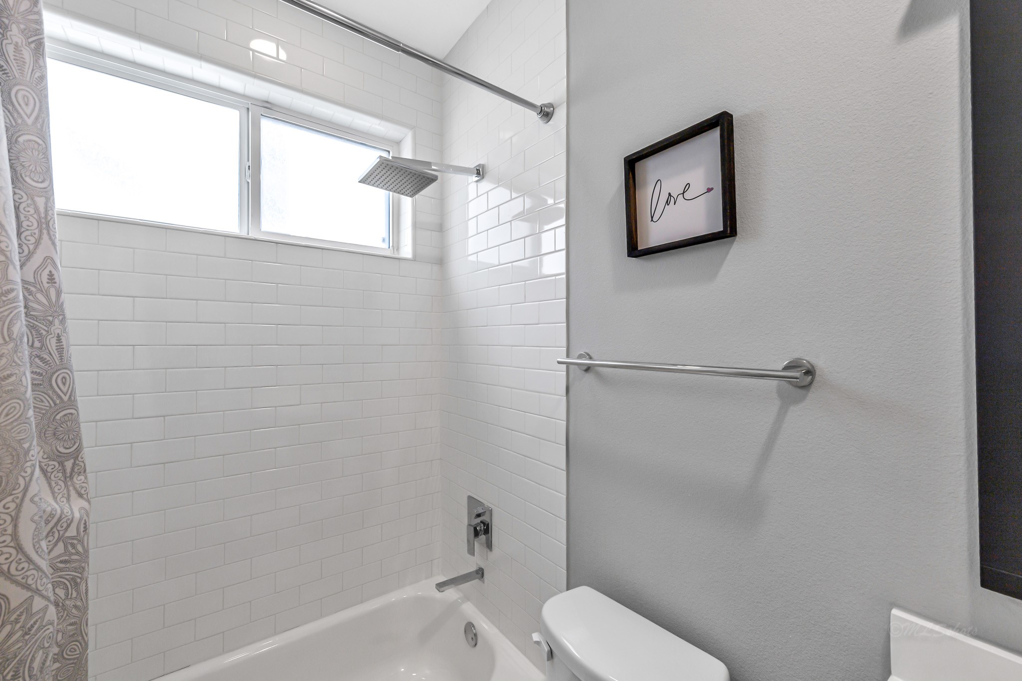 3105 Gillespie Street Houston, TX 77020 - Photo 11 of 43 a bathroom with a toilet and a shower