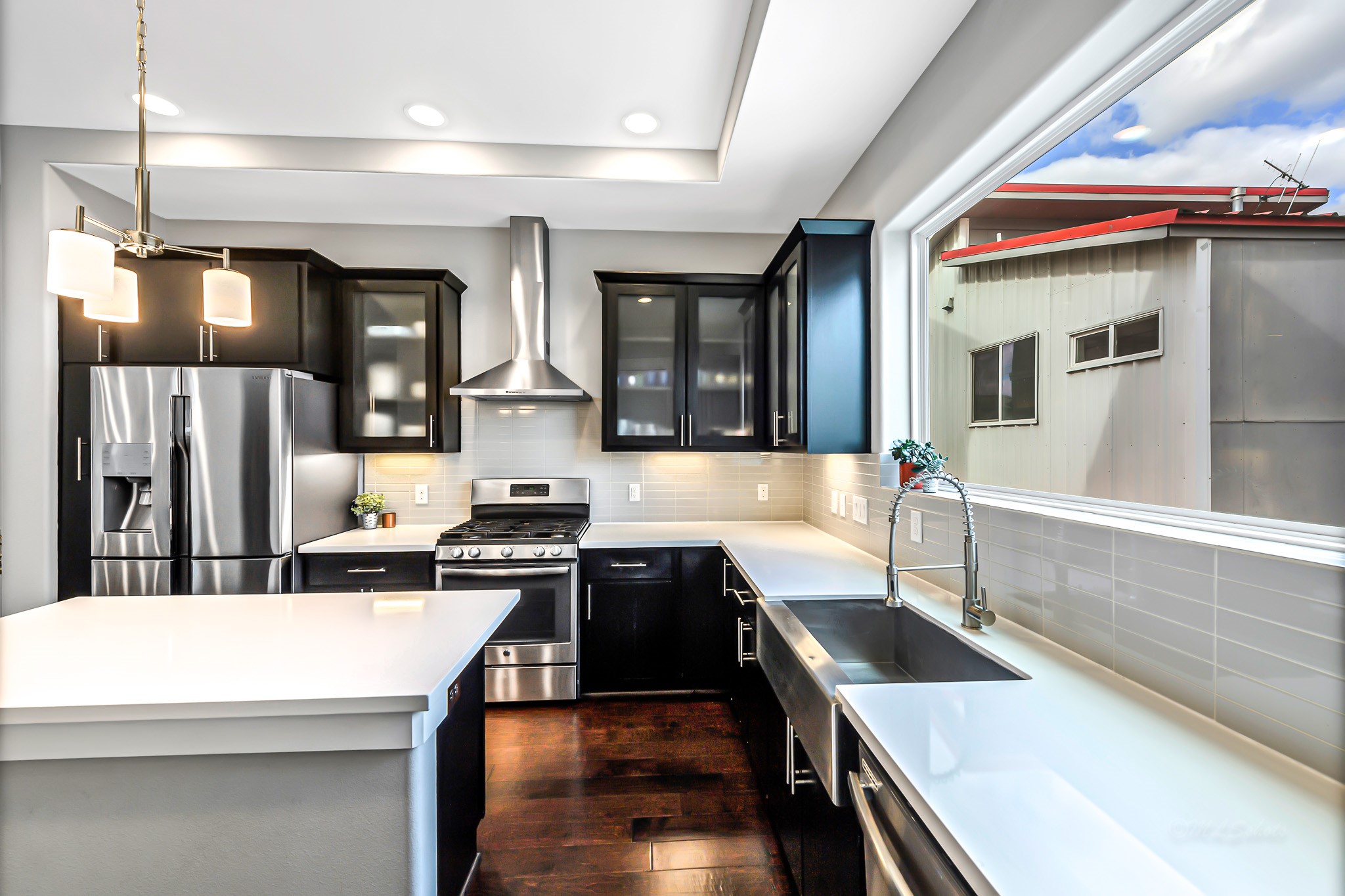 3105 Gillespie Street Houston, TX 77020 - Photo 22 of 43 a kitchen with a stove a sink and a refrigerator