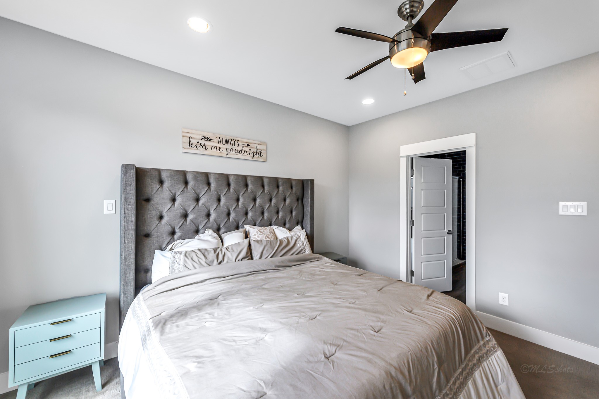 3105 Gillespie Street Houston, TX 77020 - Photo 29 of 43 a bedroom with a bed and a ceiling fan