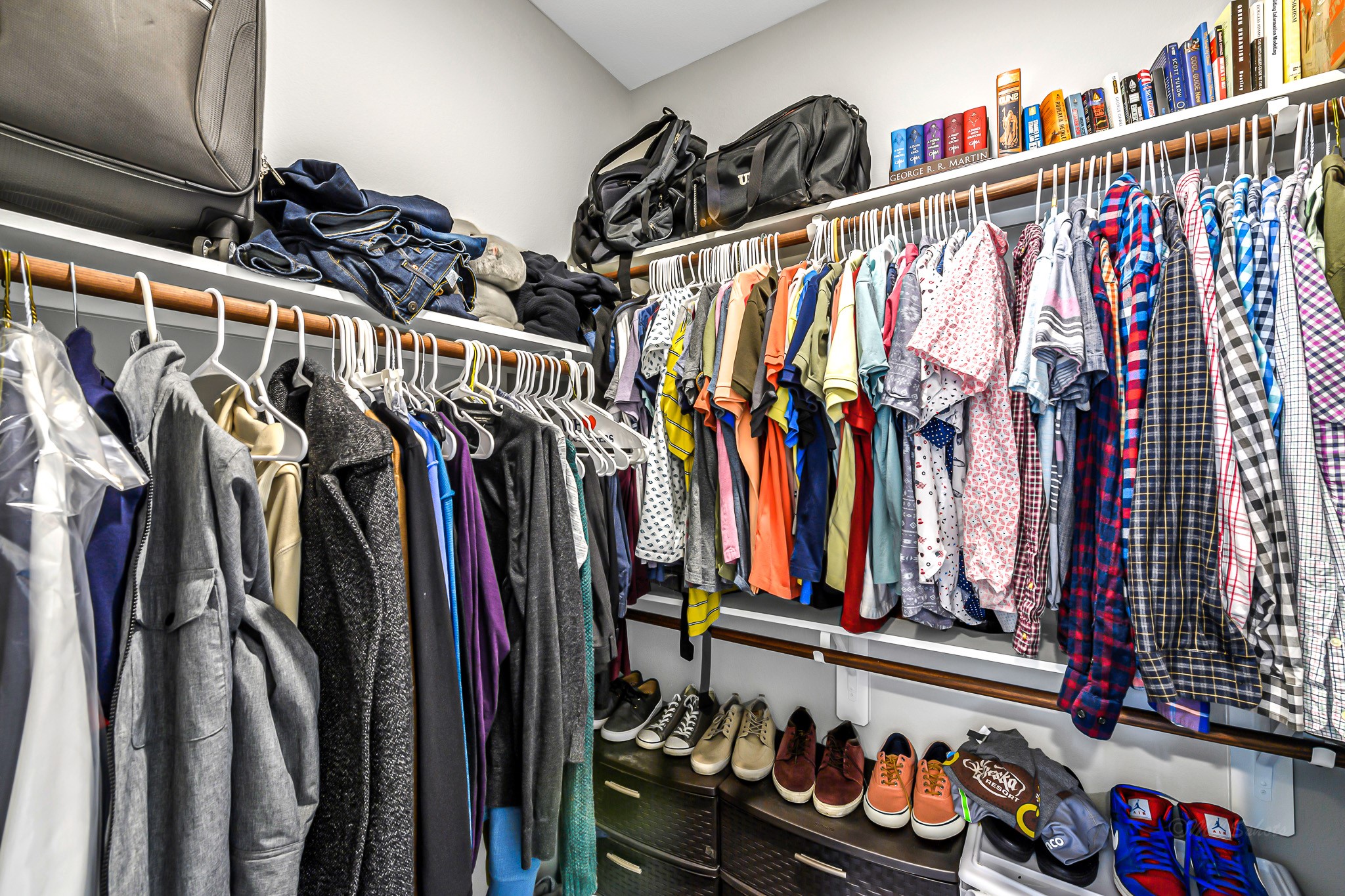 3105 Gillespie Street Houston, TX 77020 - Photo 38 of 43 a view of walk in closet with clothes and shoes