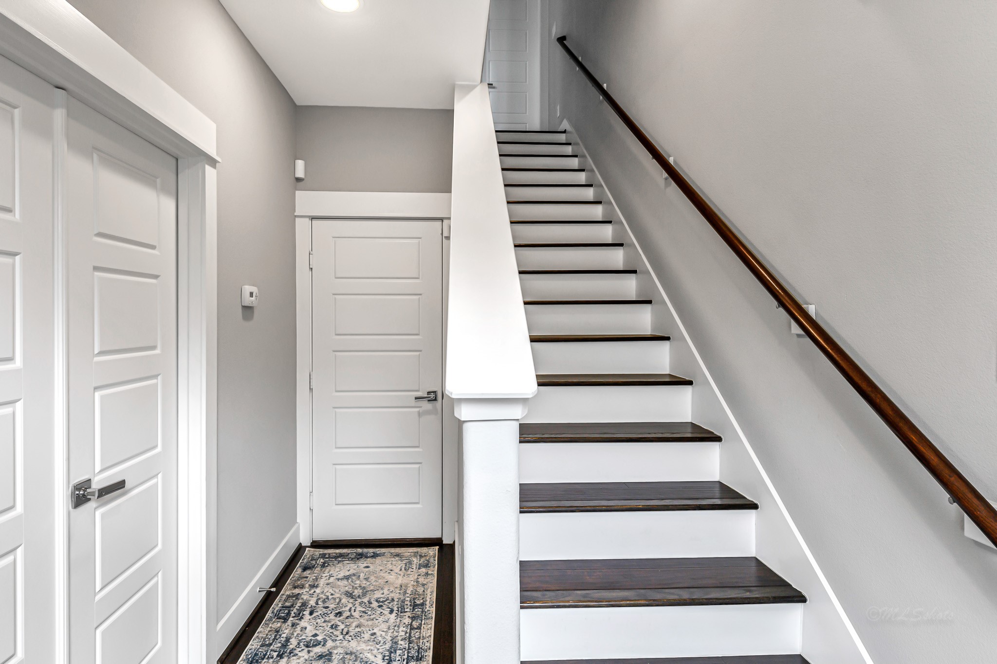 3105 Gillespie Street Houston, TX 77020 - Photo 5 of 43 a view of entryway with wooden floor and white walls