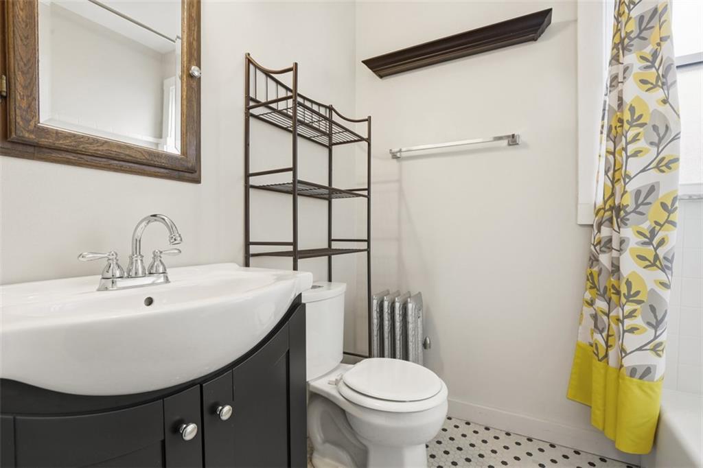 1038 Welfer Street Pittsburgh, PA 15217 - Photo 18 of 43 Main floor full bathroom with full bathtub/shower.