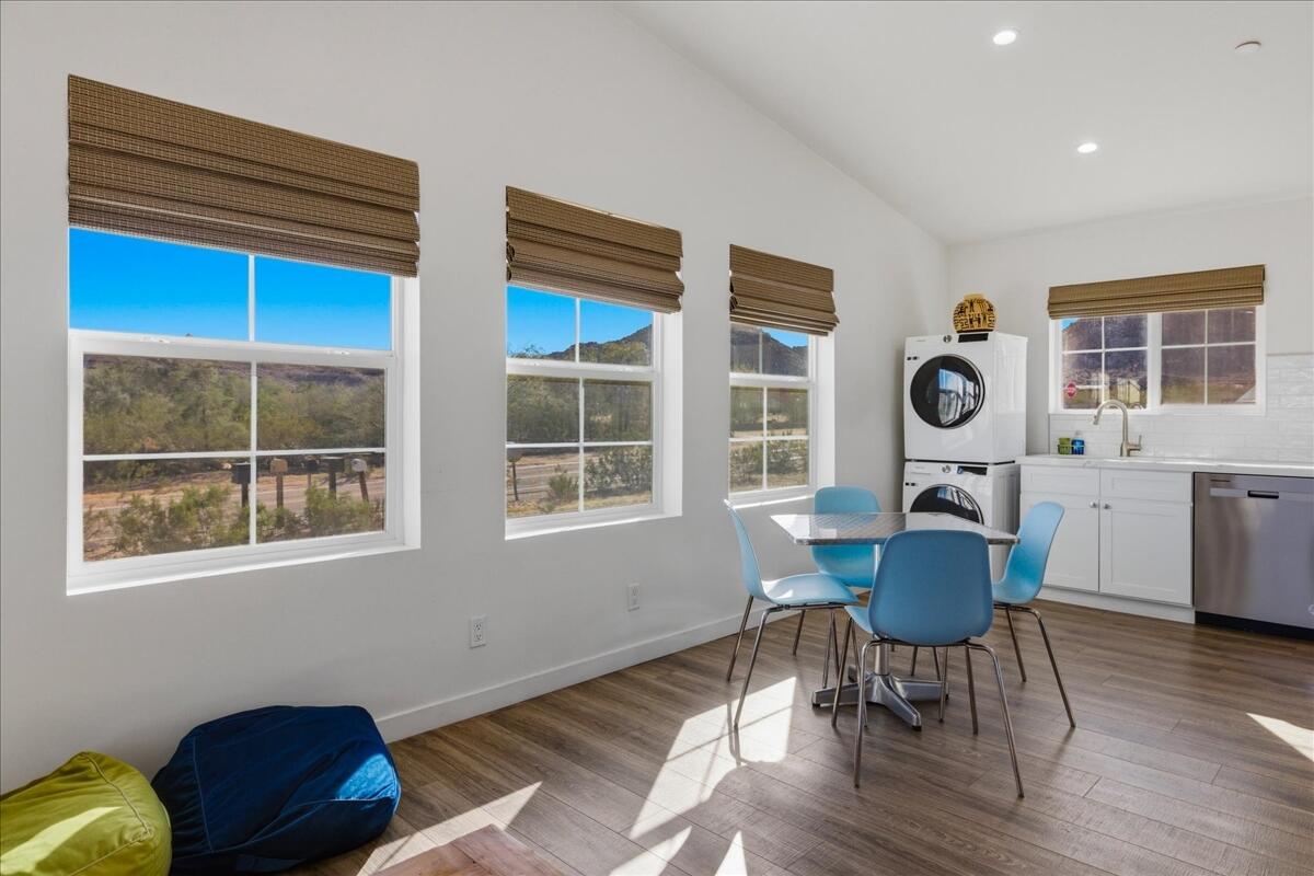 4884 Avenida Del Sol Joshua Tree, CA 92252 - Photo 19 of 66 a living room with furniture and a window
