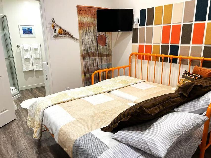 4884 Avenida Del Sol Joshua Tree, CA 92252 - Photo 37 of 66 a bedroom with a bed and walk in closet