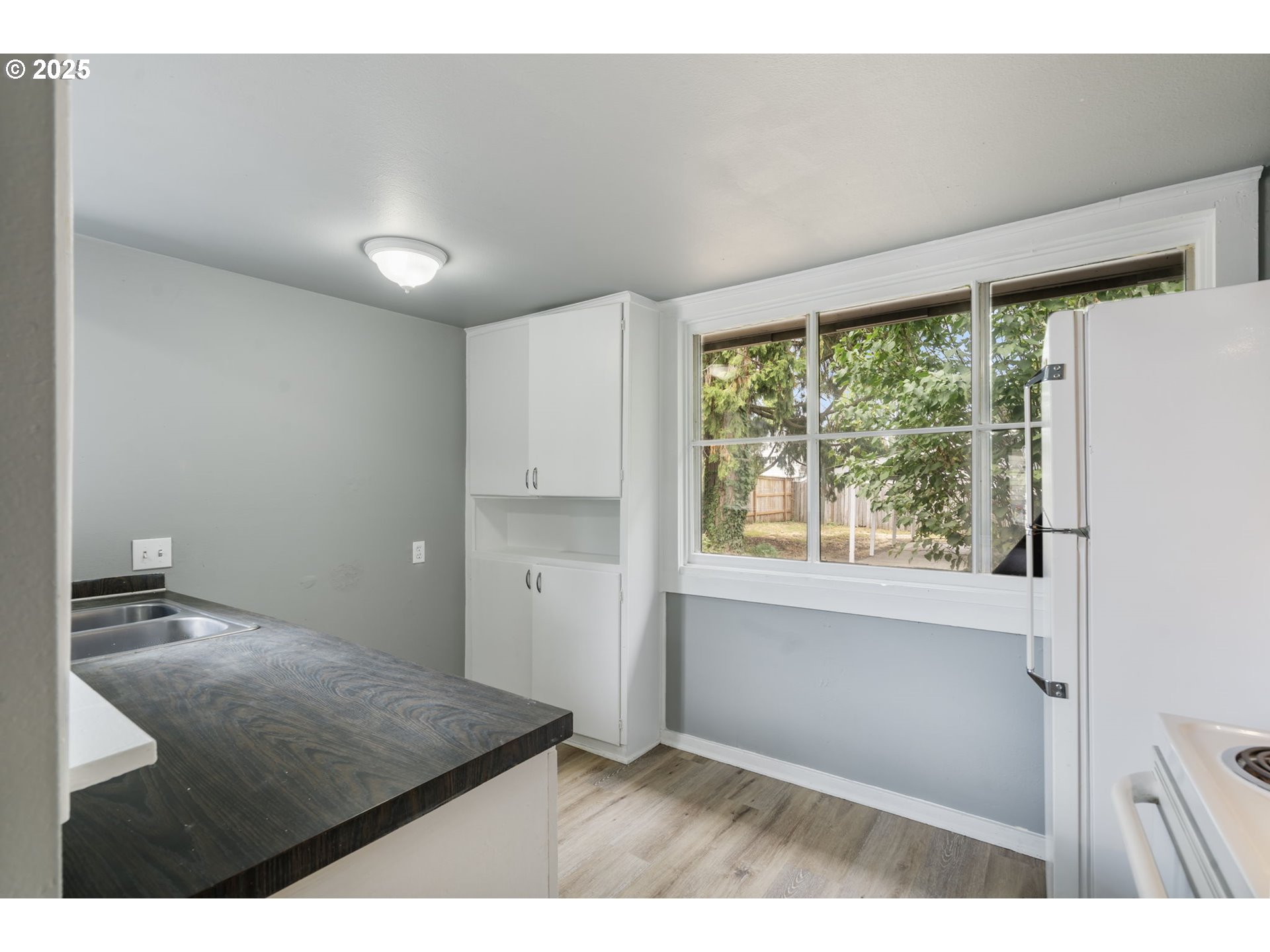2035 4th Street Northeast Salem, OR 97301 - Photo 13 of 45 a view of an empty room with a window