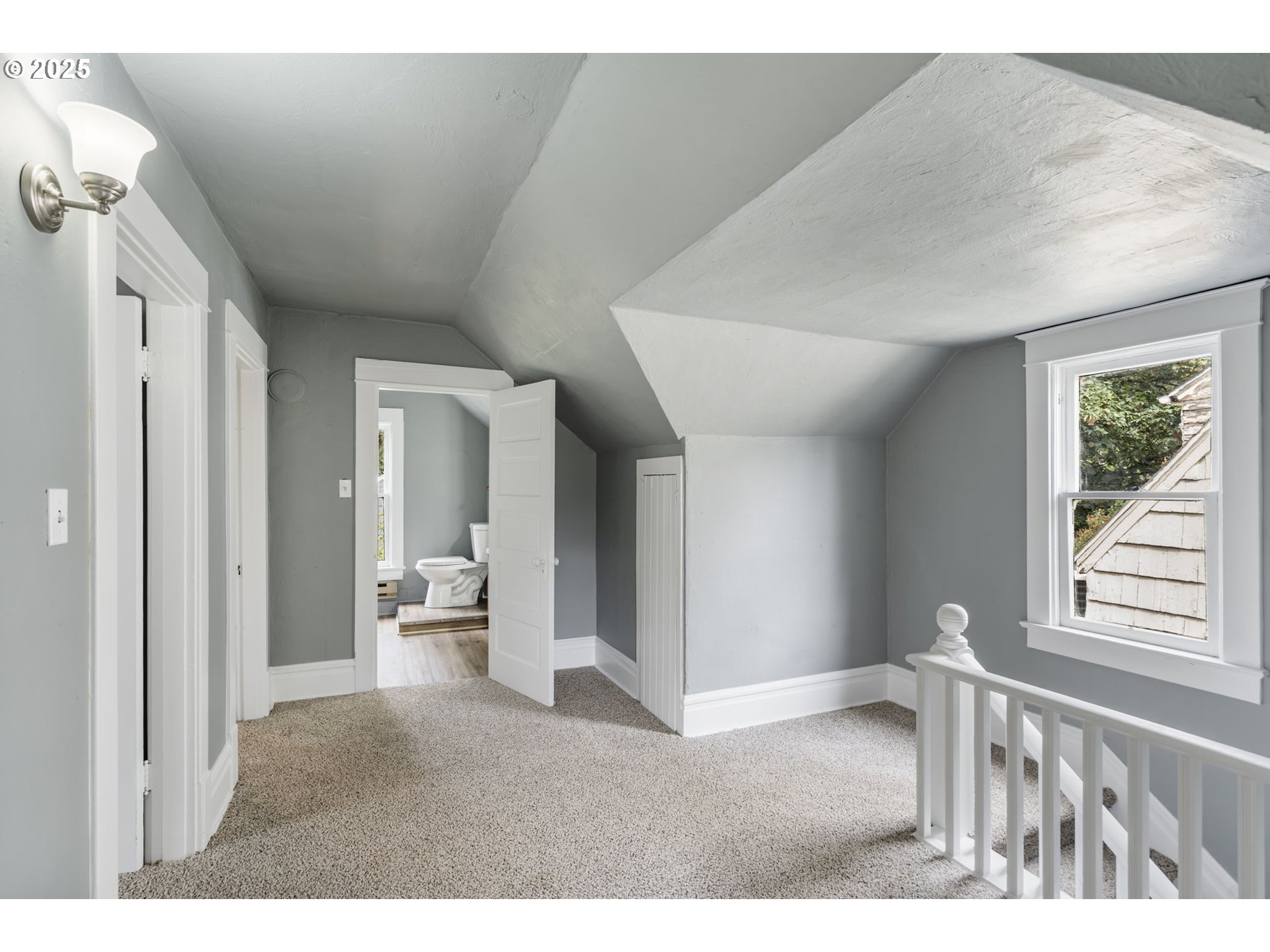 2035 4th Street Northeast Salem, OR 97301 - Photo 18 of 45 a living room with furniture and a large window