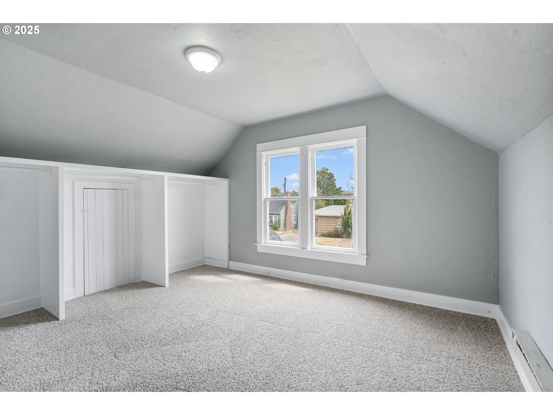 2035 4th Street Northeast Salem, OR 97301 - Photo 22 of 45 a view of an empty room with a window