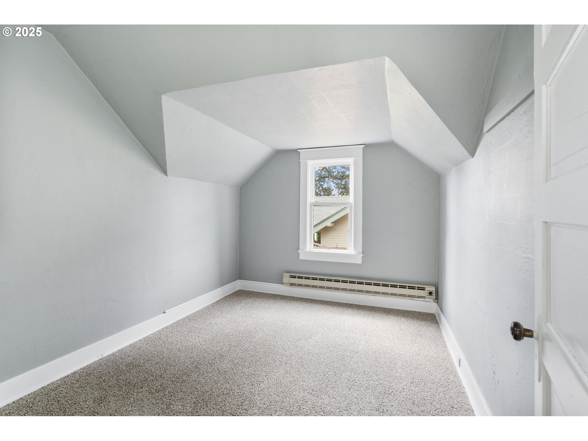 2035 4th Street Northeast Salem, OR 97301 - Photo 25 of 45 a view of an empty room with a window