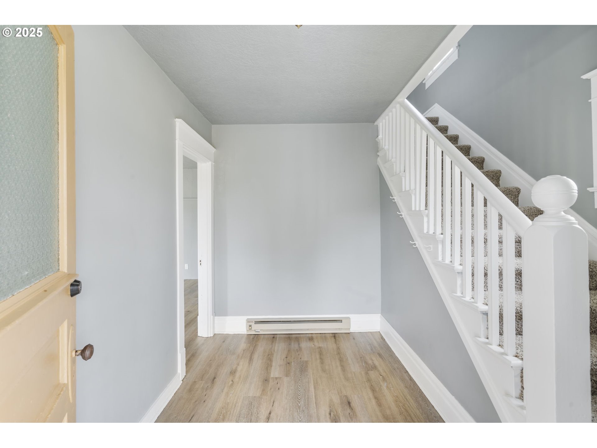 2035 4th Street Northeast Salem, OR 97301 - Photo 3 of 45 a view of an entryway with wooden floor