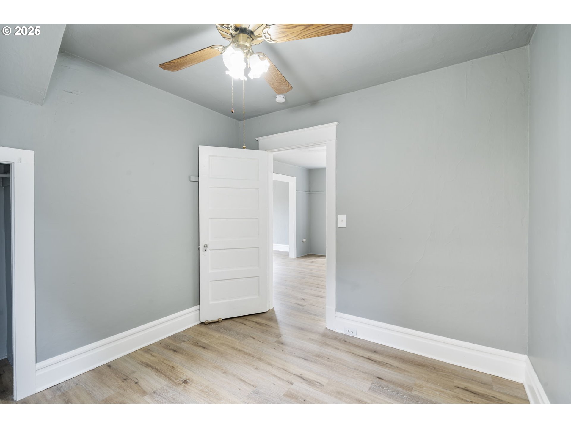 2035 4th Street Northeast Salem, OR 97301 - Photo 31 of 45 a view of an empty room with wooden floor