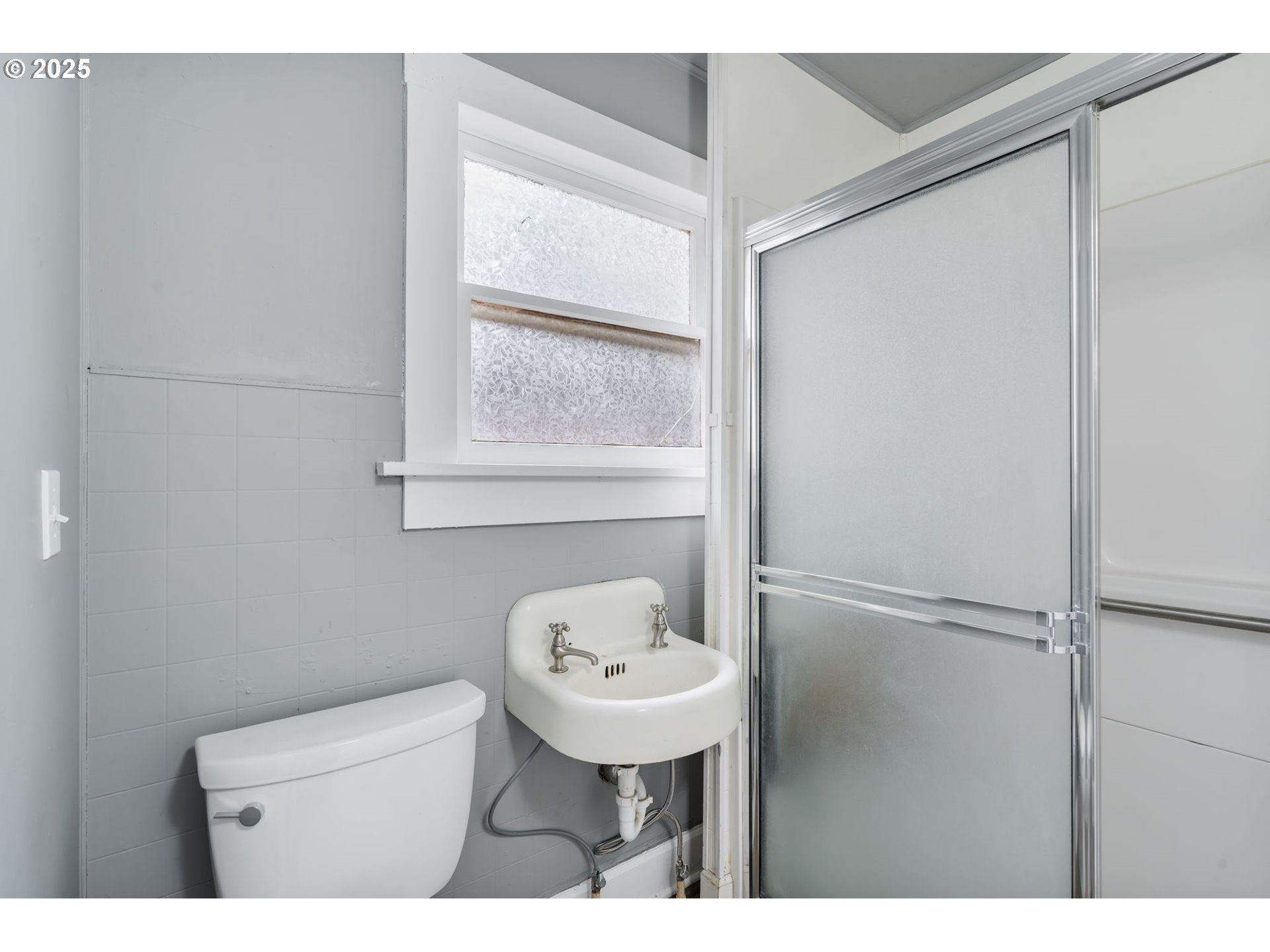 2035 4th Street Northeast Salem, OR 97301 - Photo 32 of 45 a bathroom with a sink mirror toilet and vanity
